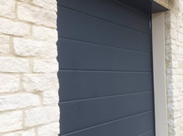 Sectional garage doors