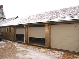 Sectional garage doors